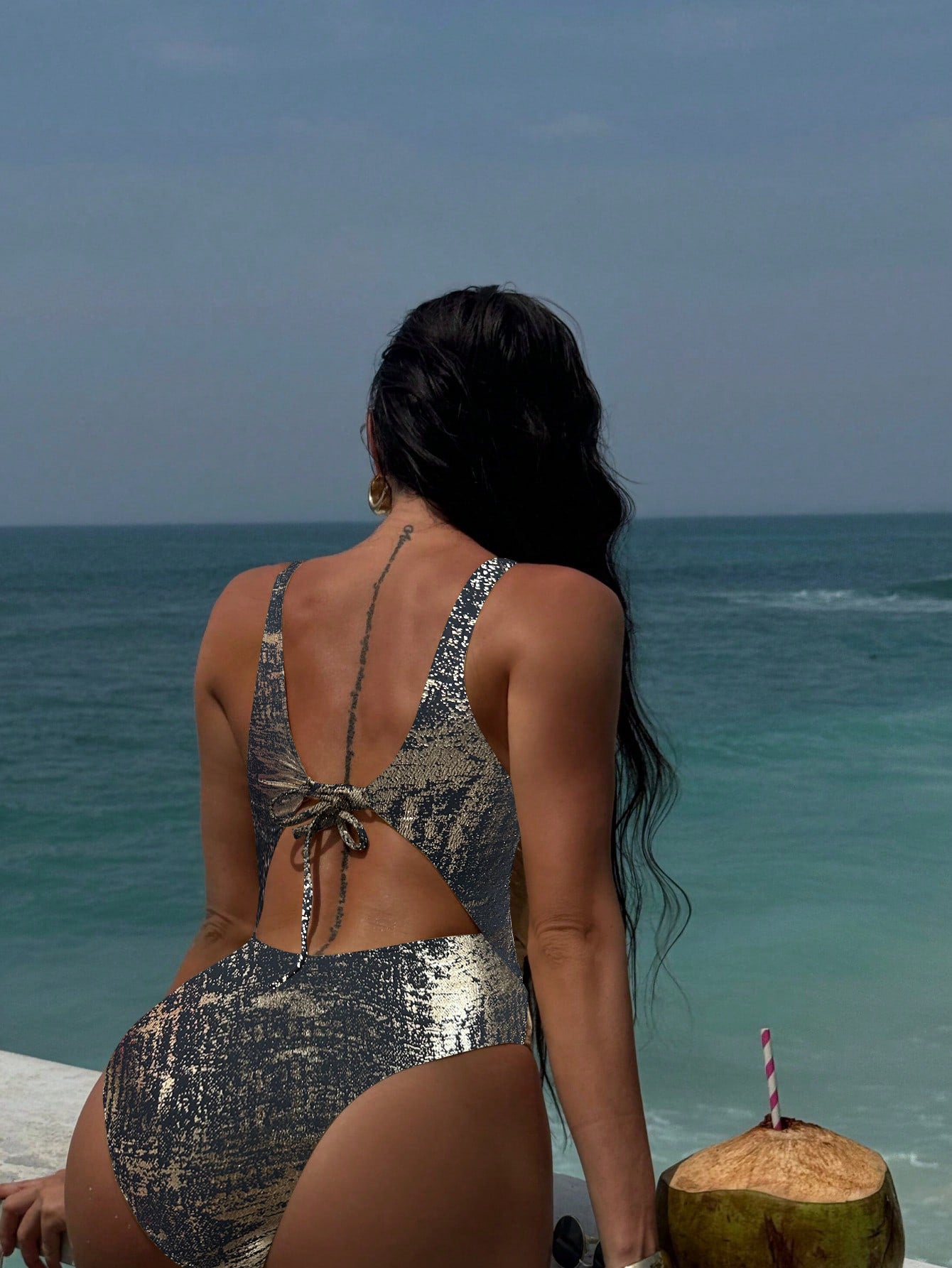 Shiny One Piece Swimsuit with Deep V Plunge and Lace-Up Back